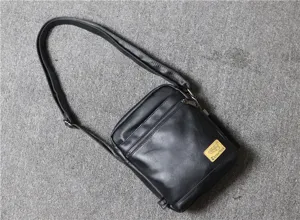 Men black soft leather vertical crossbody bag casual messenger shoulder bag daily use.
