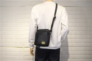 Men black vertical messenger bag casual outdoor crossbody bag stylish shoulder bag detail view