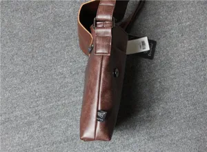 Close-up detail of the brown leather men messenger bag showing texture, side profile, hardware.