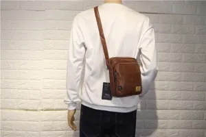 Men's brown vertical shoulder bag PU leather casual crossbody bag for outdoor daily use.