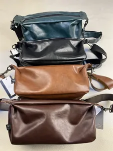 Close-up detail of multi-color minimalist retro men crossbody bags with adjustable strap.