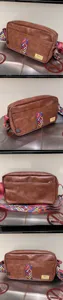 Retro casual brown messenger bag with ethnic woven strap, soft leather trendy shoulder bag.