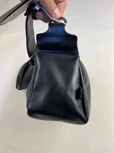 Black leather retro crossbody bag for men, stylish minimalist shoulder bag design.