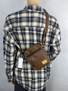 Men women vertical PU leather crossbody bag casual retro shoulder bag detailed view showcase.