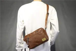 Threebox casual men's leather crossbody shoulder bag with zipper pocket and adjustable strap.