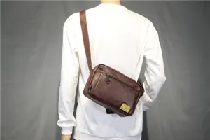 Men's brown PU leather casual crossbody shoulder bag detail showcasing zipper pockets.