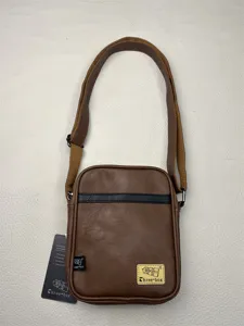 Brown vertical crossbody bag, casual sports student shoulder bag for men and women.