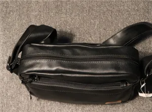 Men casual black leather shoulder bag with double zipper and front pocket for daily use.