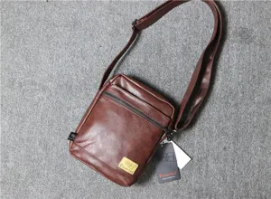 Men vintage soft leather vertical crossbody bag, retro square shoulder messenger bag detail.