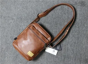 Men vintage brown leather vertical messenger bag casual shoulder cross body bag for daily use.