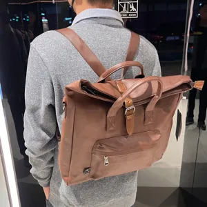 Sac à dos vintage en cuir PU marron pour homme, cartable d'affaires décontracté voyage.