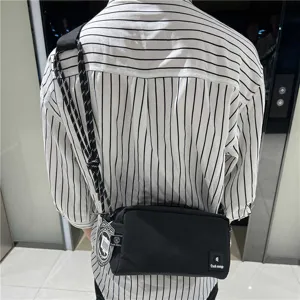 Stylish black canvas crossbody bag for men and women casual daily commuter shoulder bag