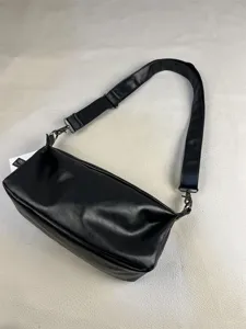 Men black minimalist vintage crossbody shoulder bag casual street style daily commuter bag detail