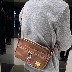 Vintage casual men's crossbody bag soft leather shoulder bag with ethnic colorful woven strap