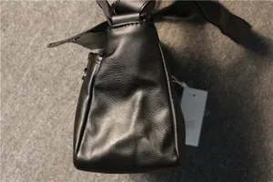 Men black leather vintage shoulder bag side detail view stylish motorcycle messenger bag
