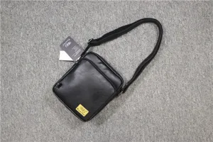 Men's black vertical shoulder bag, stylish casual PU leather cross-body messenger bag.