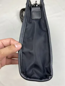 Men black nylon shoulder bag side detail, casual crossbody bag with durable fabric.