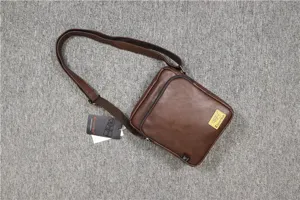 Men's brown vertical PU leather shoulder bag, casual outdoor crossbody bag with adjustable strap.