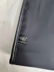 Three-box nylon messenger bag men detail view showing zipper and durable fabric quality.