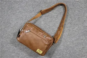 Men soft leather messenger bag with adjustable strap and front zipper pocket detail view.