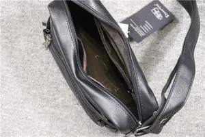 Detailed view of black soft leather men crossbody bag with multiple zipper pockets.