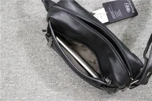 Men black soft leather crossbody bag detail view, multi-pocket zipper shoulder bag.