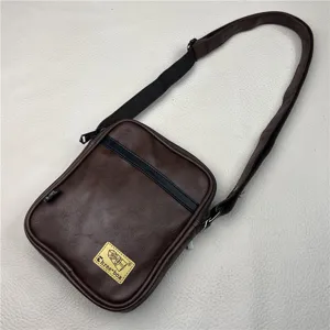 Fashion vertical crossbody bag for men and women, casual PU leather shoulder bag daily use.