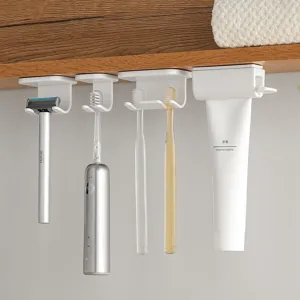 Wandmontage badkamer organizer, omgekeerde tandenborstelhouder en tandpastaknijper set.