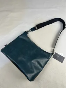 Dark leather shoulder crossbody bag for men, casual large capacity motorcycle style detail.