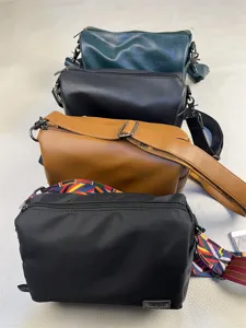 Casual nylon and leather shoulder bags set, multi-color crossbody bags for men and women.