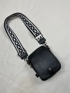 Men black vertical crossbody bag with wide black and white patterned strap daily casual simple shoulder bag