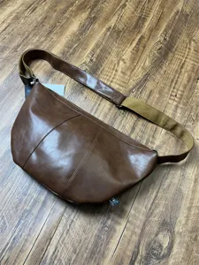 Retro brown leather dumpling bag casual sling messenger bag for men daily commute and outdoor