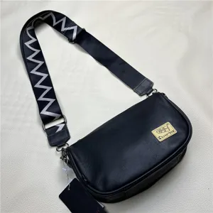 Black crossbody bag for men women casual stylish shoulder bag with wide strap and logo patch.