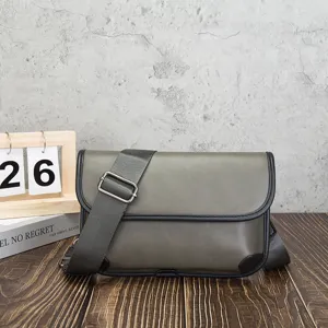 Close-up view of the casual leather messenger shoulder bag featuring adjustable strap and details.