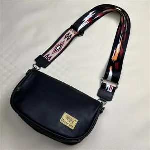 Black PU leather crossbody bag with colorful geometric wide strap and front logo patch