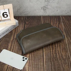 Men's retro soft leather clutch bag detail shot, vintage style daily small shoulder bag.