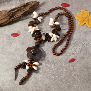 Vintage bohemian style wooden bead shell flower pendant long sweater necklace detail.