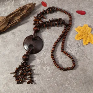 Bohemian ethnic long wooden necklace with handmade coconut shell pendant for women vacation.