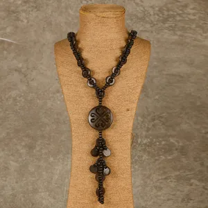 Bohemian ethnic long wooden shell beaded necklace detail view, vintage dark brown design.