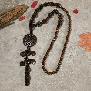 Retro bohemian handmade wooden coconut shell long necklace detail, ethnic sweater chain pendant.