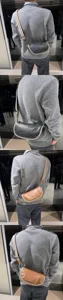 Sac bandoulière décontracté pour homme en cuir souple avec coutures élégantes et sangle à motif.