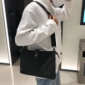 Bolso bandolera negro de nylon para hombres y mujeres, bolso mensajero casual diario.