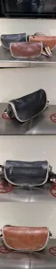 Vue détaillée du sac bandoulière décontracté en cuir souple avec coutures et sangle réglable.