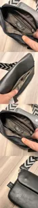 Men shoulder bag details showing multiple compartments, zippers and wide geometric pattern strap.
