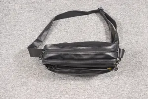 Black multi-zipper leather crossbody bag, casual motorcycle shoulder bag detail view.