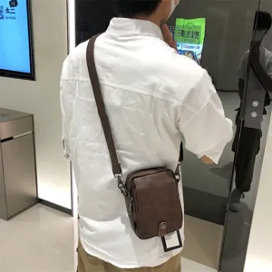 Men's brown leather vertical crossbody bag, Japanese casual soft shoulder bag daily use.