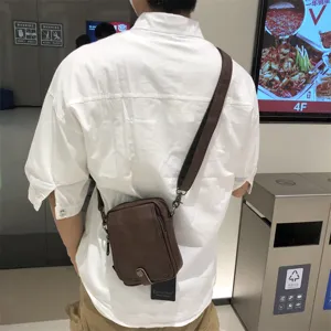 Men's retro vertical leather crossbody bag casual small shoulder bag daily outdoor travel use.
