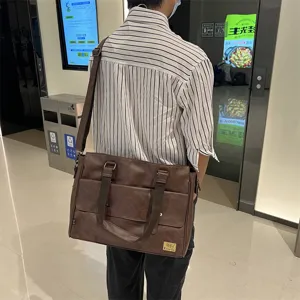 Sac d'affaires marron élégant pour homme en cuir PU, sac bandoulière et messager polyvalent voyage.