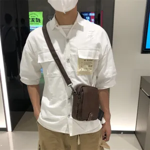 Threebox casual soft leather vertical crossbody bag for men and women, stylish daily shoulder pack.