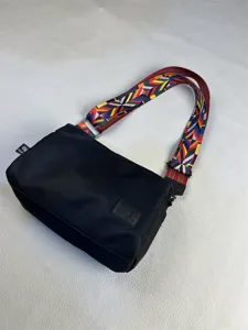 Black nylon crossbody bag with colorful geometric strap casual shoulder bag for daily commute